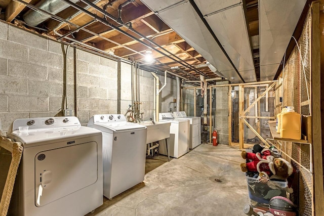 1128 S 62nd St, West Allis, WI 53214 - unfinished basement featuring washing machine and clothes dryer and a sink