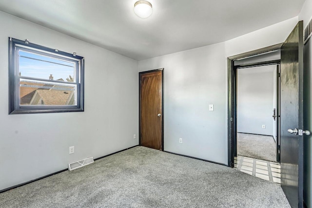 1128 S 62nd St, West Allis, WI 53214 - unfurnished bedroom featuring carpet floors and baseboards