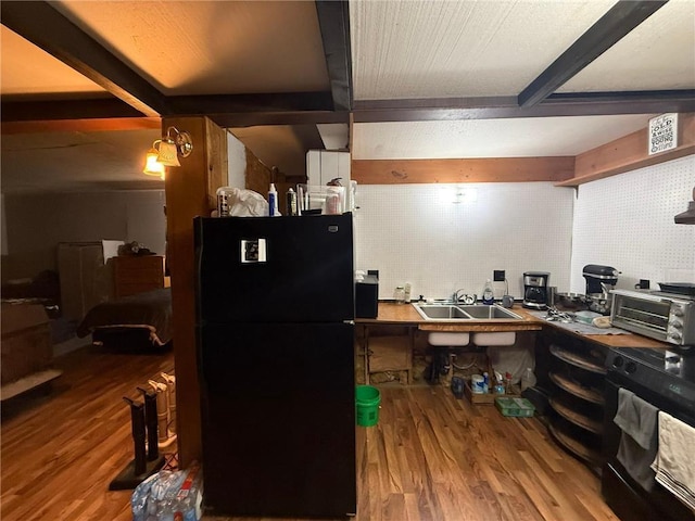 1330 21 3/4 St Unit A, Cameron, WI 54822 - kitchen with black appliances and wood finished floors
