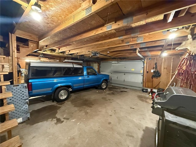 1330 21 3/4 St Unit A, Cameron, WI 54822 - garage with a garage door opener