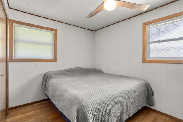 1002 Grove St, Oshkosh, WI 54901 - bedroom featuring wood finished floors and a ceiling fan