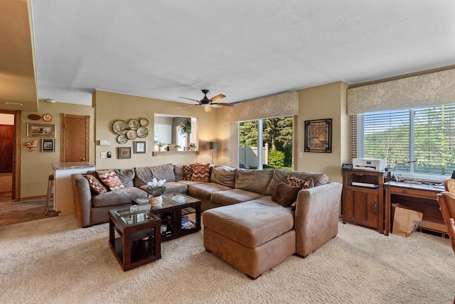 618 Westridge Dr, West Bend, WI 53095 - living room featuring light carpet and ceiling fan
