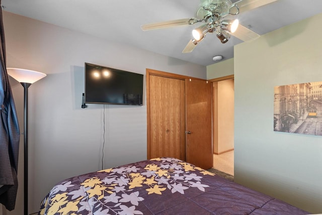 618 Westridge Dr, West Bend, WI 53095 - bedroom with a closet, ceiling fan, and carpet flooring