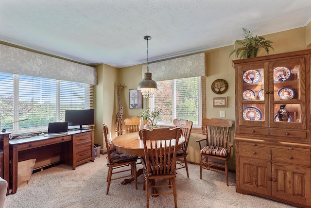 618 Westridge Dr, West Bend, WI 53095 - dining room with light carpet, a desk, ornamental molding, and a textured ceiling