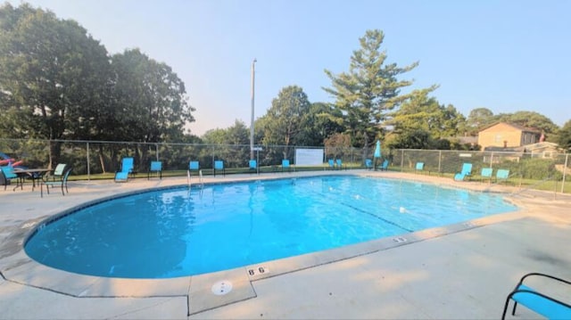 618 Westridge Dr, West Bend, WI 53095 - community pool with a patio