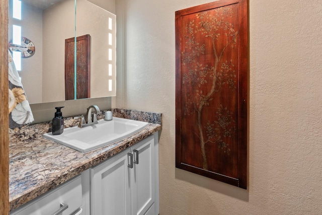 618 Westridge Dr, West Bend, WI 53095 - bathroom with a textured wall and vanity