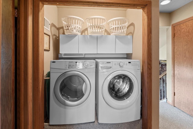 618 Westridge Dr, West Bend, WI 53095 - washroom with washing machine and dryer, cabinet space, and carpet