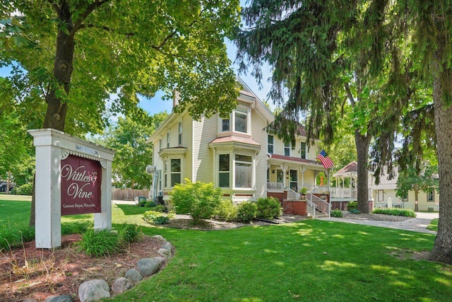 W318S4121 Highview Rd, Waukesha, WI 53189 - view of front facade with covered porch and a front yard