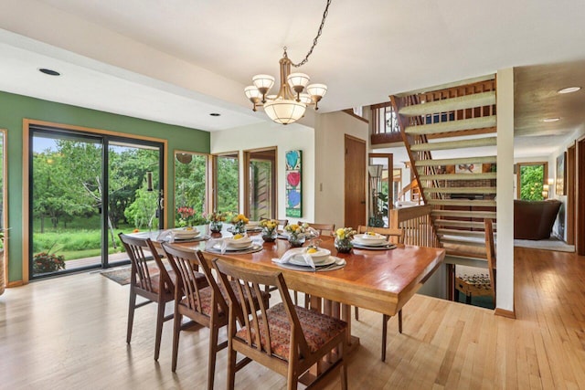 W318S4121 Highview Rd, Waukesha, WI 53189 - dining space with hardwood / wood-style flooring, stairs, a chandelier, and recessed lighting