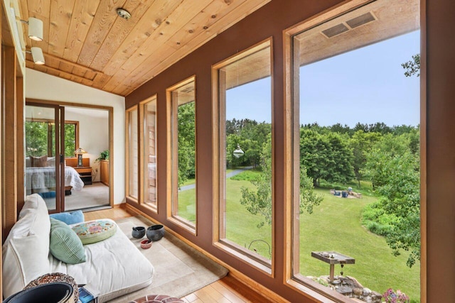 W318S4121 Highview Rd, Waukesha, WI 53189 - sunroom featuring hardwood / wood-style floors, healthy amount of natural light, lofted ceiling, and wooden ceiling