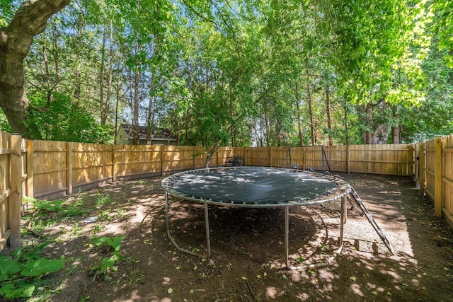500 S Pierce Ave, Appleton, WI 54914 - fenced backyard with a trampoline