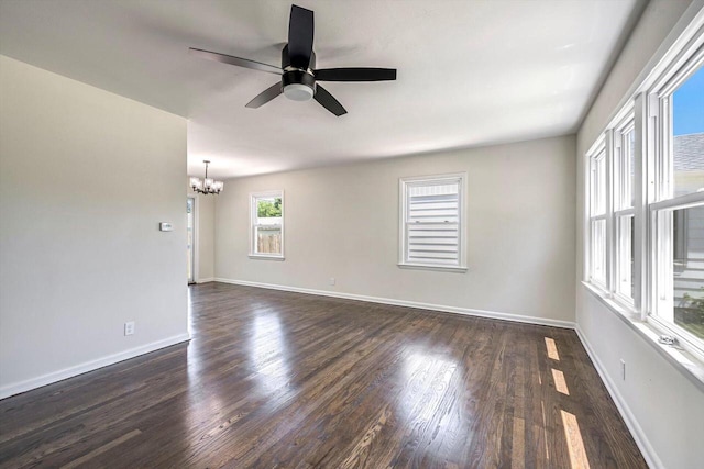 2316 W Rohr Ave, Milwaukee, WI 53209 - empty room featuring a chandelier, ceiling fan, and dark wood-type flooring