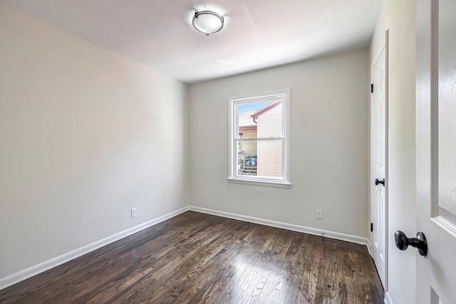 2316 W Rohr Ave, Milwaukee, WI 53209 - unfurnished room featuring dark wood-style floors and baseboards