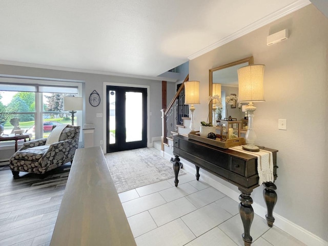 431 Limestone St, Kiel, WI 53042 - entrance foyer with ornamental molding, stairway, and light tile patterned floors