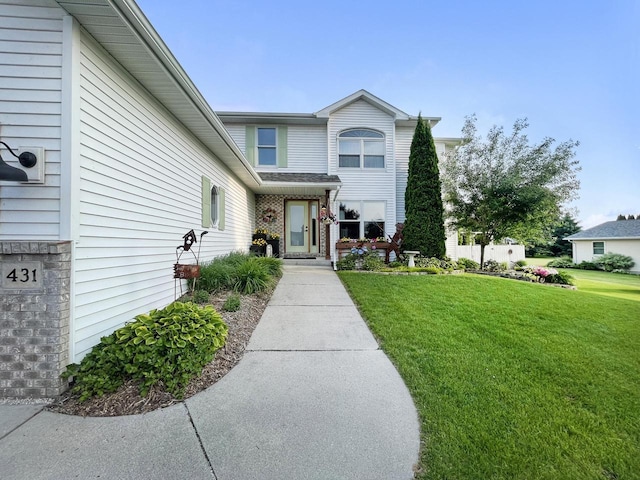 431 Limestone St, Kiel, WI 53042 - view of front of property with a front yard
