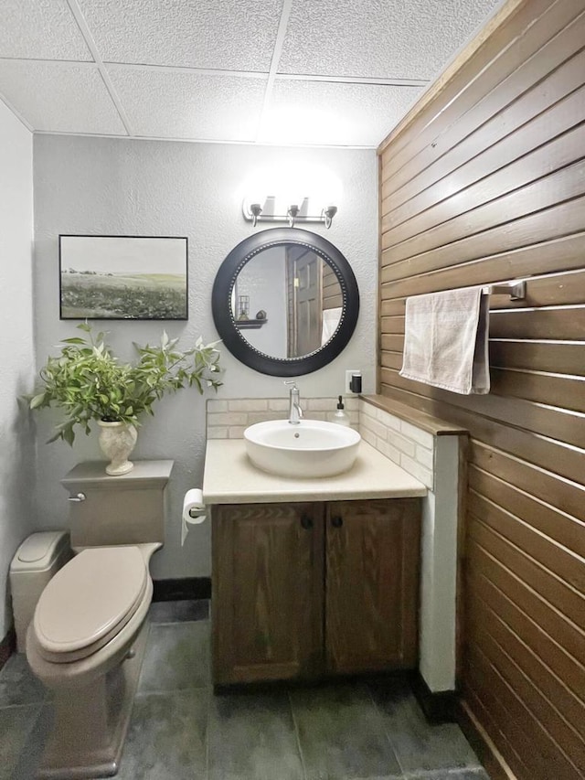 431 Limestone St, Kiel, WI 53042 - bathroom featuring vanity and decorative backsplash