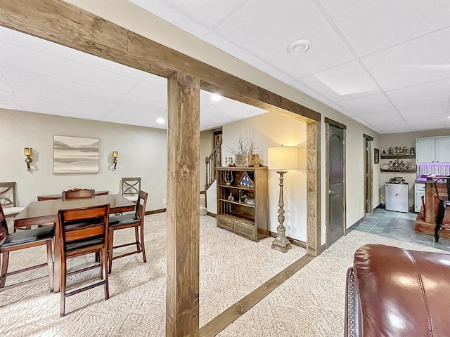 431 Limestone St, Kiel, WI 53042 - finished basement with a paneled ceiling and light colored carpet