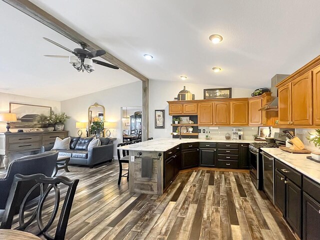 431 Limestone St, Kiel, WI 53042 - kitchen featuring gas range, open floor plan, dark wood-style flooring, ceiling fan, and open shelves