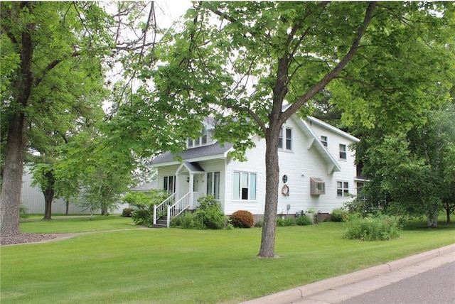 514 S Robert St, Grantsburg, WI 54840 - view of front of home featuring a front lawn