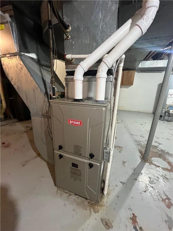 514 S Robert St, Grantsburg, WI 54840 - utility room featuring water heater