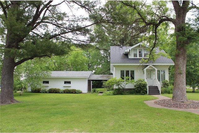 514 S Robert St, Grantsburg, WI 54840 - view of front of home featuring a front lawn
