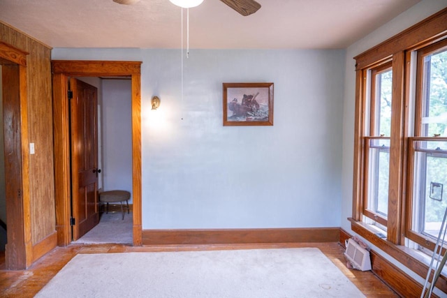 318 Tremont St, Mauston, WI 53948 - empty room with ceiling fan and light wood-style flooring