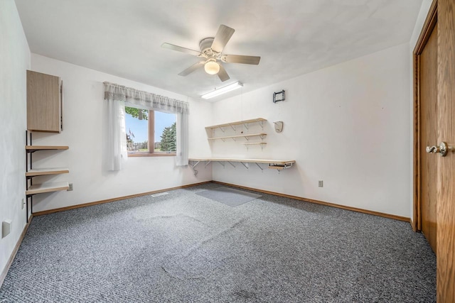 942 E Mayfield Dr, Appleton, WI 54911 - unfurnished living room featuring carpet and a ceiling fan