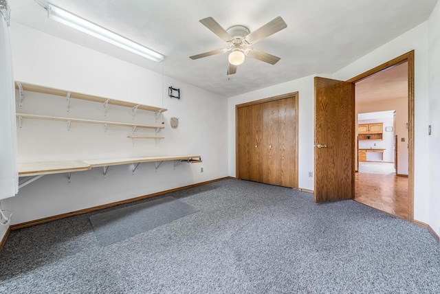 942 E Mayfield Dr, Appleton, WI 54911 - unfurnished bedroom with carpet floors, a closet, and a ceiling fan
