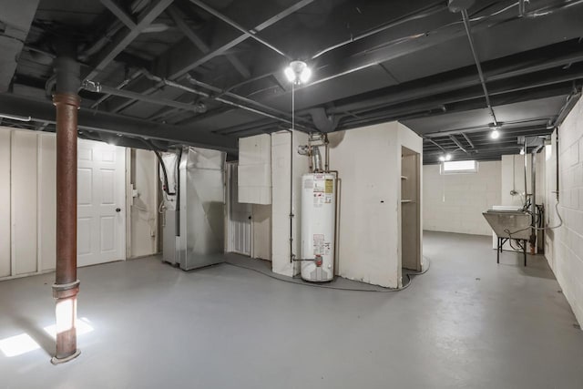 3700 S 21st St, Milwaukee, WI 53221 - below grade area featuring water heater and heating unit