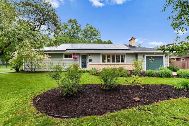 5706 Tolman Ter, Madison, WI 53711 - ranch-style house with a garage, brick siding, a chimney, and solar panels
