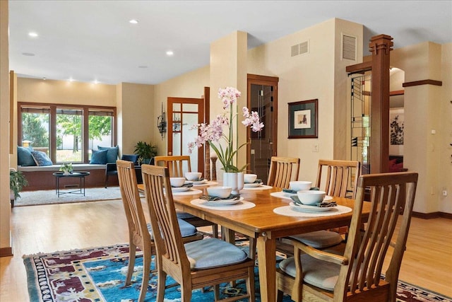 5870 Persimmon Dr, Fitchburg, WI 53711 - dining area with wood finished floors, recessed lighting, and vaulted ceiling