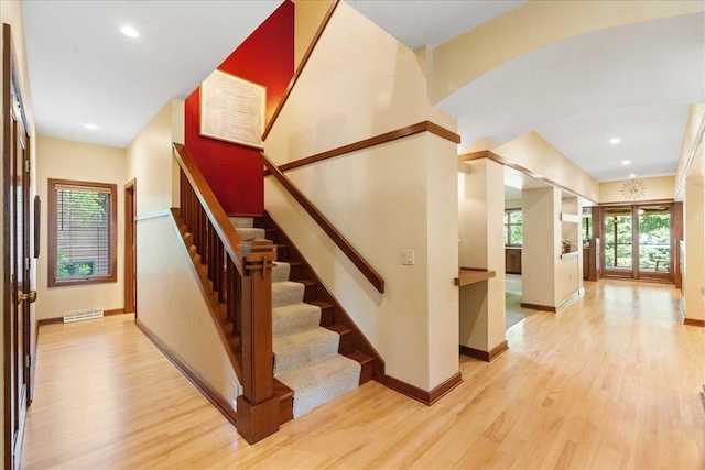 5870 Persimmon Dr, Fitchburg, WI 53711 - stairway with wood finished floors and recessed lighting