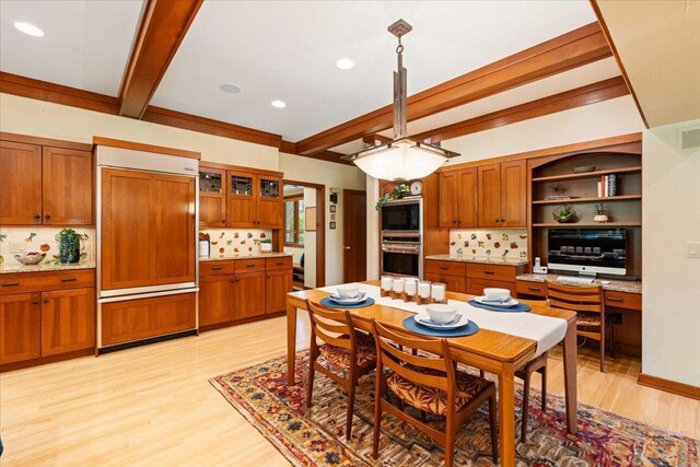 5870 Persimmon Dr, Fitchburg, WI 53711 - dining space with beam ceiling, light wood-style flooring, and recessed lighting