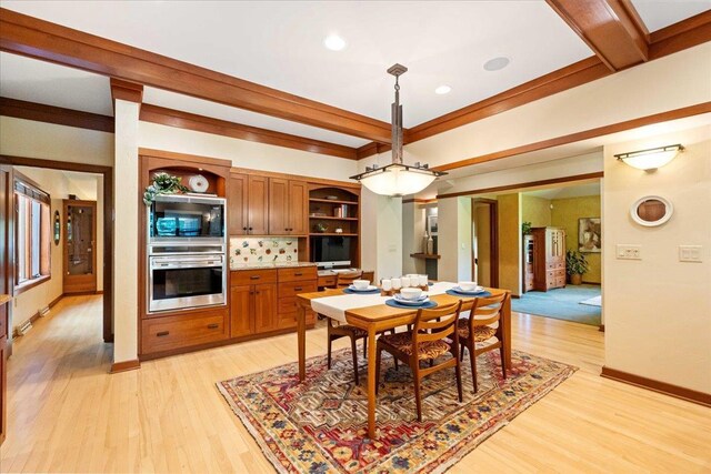 5870 Persimmon Dr, Fitchburg, WI 53711 - dining space featuring light wood-style flooring, beamed ceiling, and recessed lighting