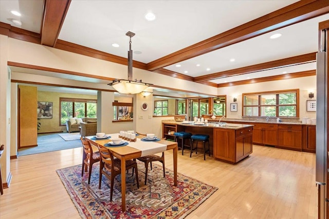 5870 Persimmon Dr, Fitchburg, WI 53711 - dining space with beam ceiling, light wood finished floors, and recessed lighting