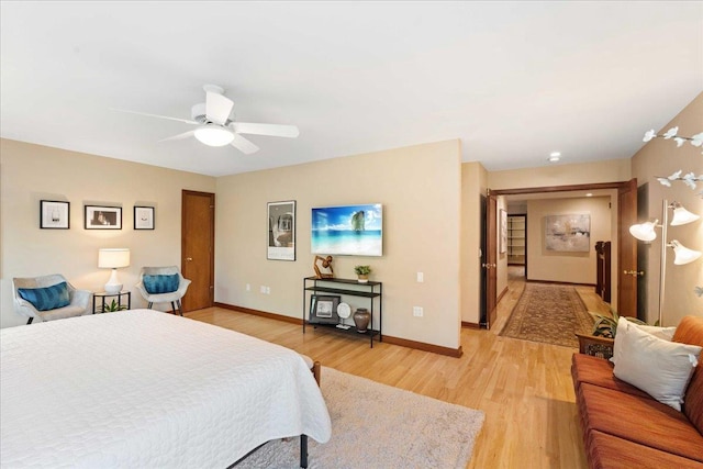 5870 Persimmon Dr, Fitchburg, WI 53711 - bedroom featuring light wood-style floors and a ceiling fan