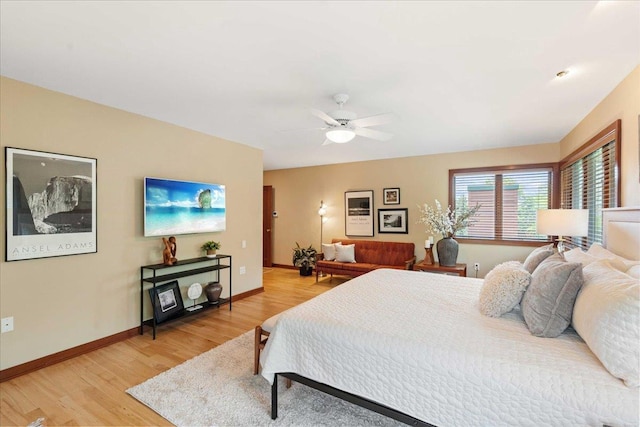 5870 Persimmon Dr, Fitchburg, WI 53711 - bedroom featuring light wood finished floors and a ceiling fan