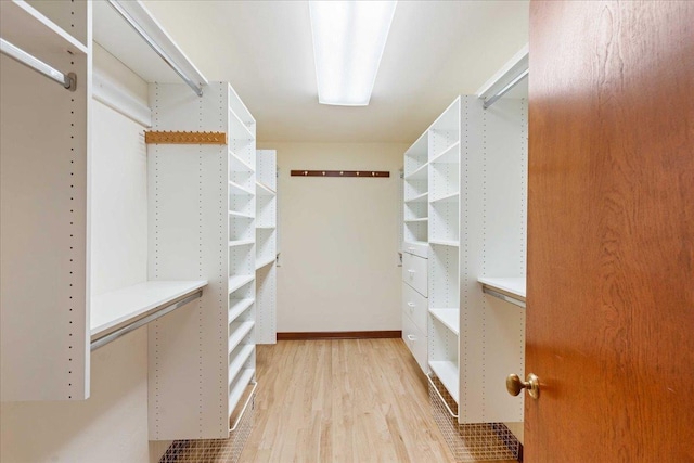 5870 Persimmon Dr, Fitchburg, WI 53711 - spacious closet with light wood-style floors