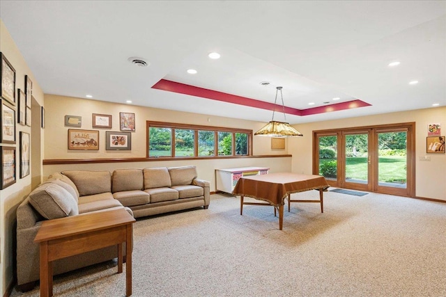 5870 Persimmon Dr, Fitchburg, WI 53711 - rec room with carpet flooring, recessed lighting, healthy amount of natural light, and a raised ceiling