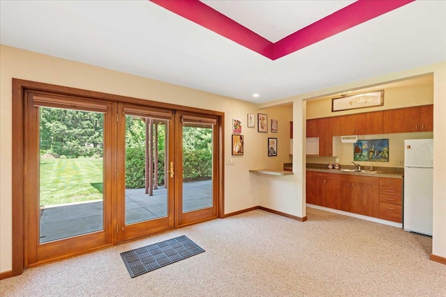 5870 Persimmon Dr, Fitchburg, WI 53711 - entryway featuring light carpet and french doors