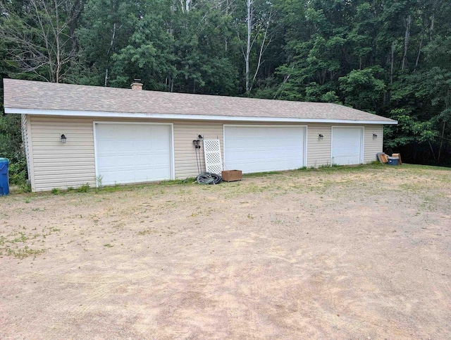 3664 Martin Rd, Kronenwetter, WI 54455 - detached garage with a forest view