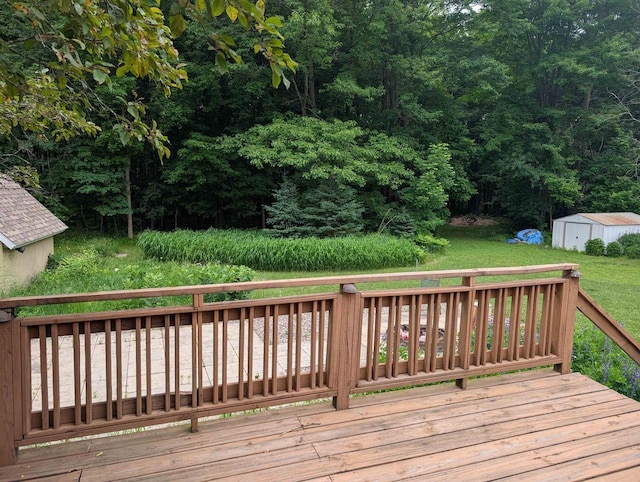 3664 Martin Rd, Kronenwetter, WI 54455 - wooden deck featuring a storage shed and a yard