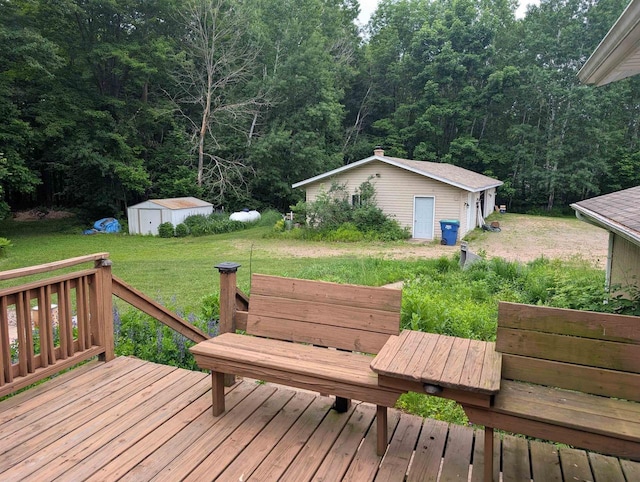 3664 Martin Rd, Kronenwetter, WI 54455 - wooden deck with a yard, a wooded view, and a storage unit