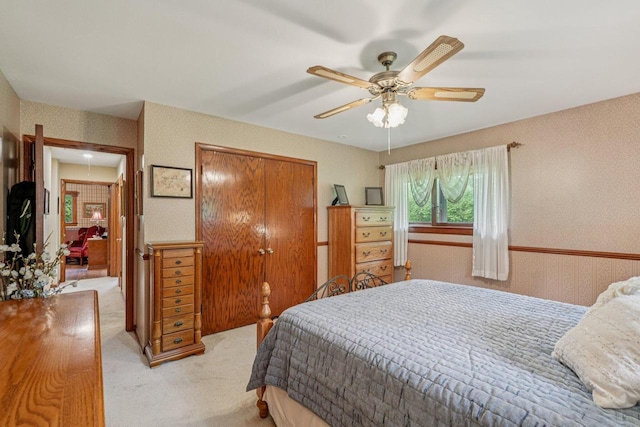 S46W22428 Tansdale Rd, Waukesha, WI 53189 - bedroom with light carpet, wallpapered walls, a closet, and ceiling fan