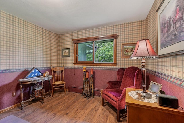 S46W22428 Tansdale Rd, Waukesha, WI 53189 - living area featuring wallpapered walls, wood finished floors, and a wainscoted wall
