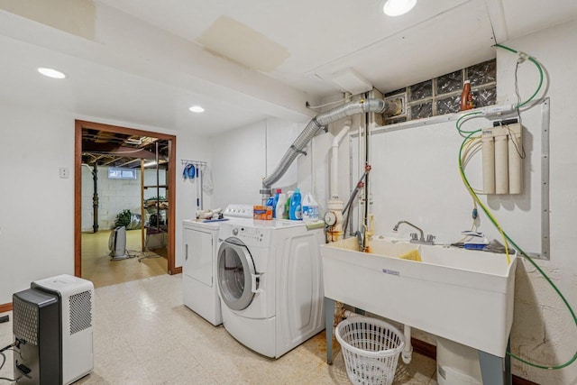 S46W22428 Tansdale Rd, Waukesha, WI 53189 - laundry room featuring independent washer and dryer, recessed lighting, and light floors