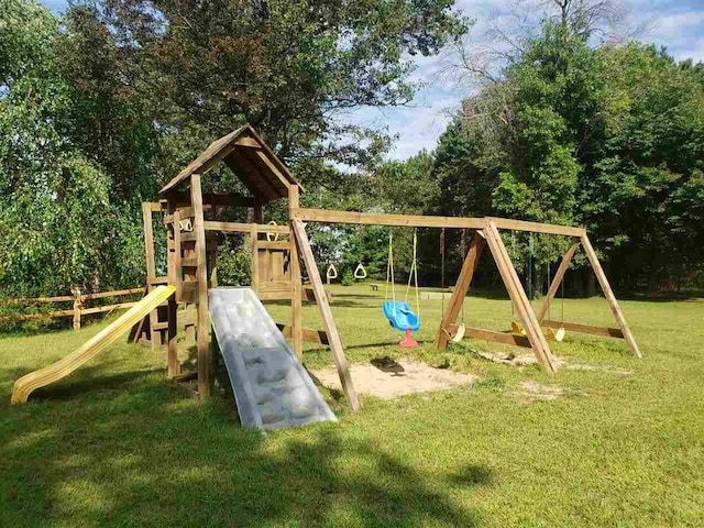 1949 Cypress Ln, Arkdale, WI 54613 - view of jungle gym with a yard and view of wooded area