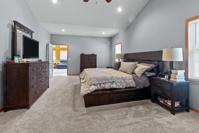 1201 Lance Dr, Twin Lakes, WI 53181 - bedroom featuring light carpet, multiple windows, vaulted ceiling, recessed lighting, and ceiling fan