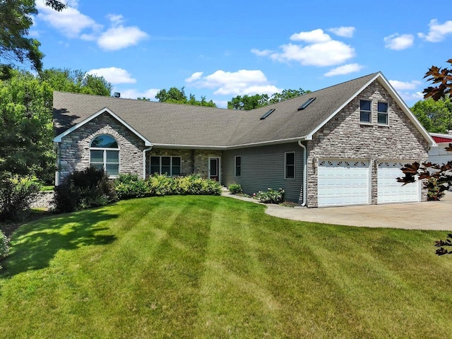 1201 Lance Dr, Twin Lakes, WI 53181 - view of front facade with stone siding, a front lawn, driveway, and roof with shingles