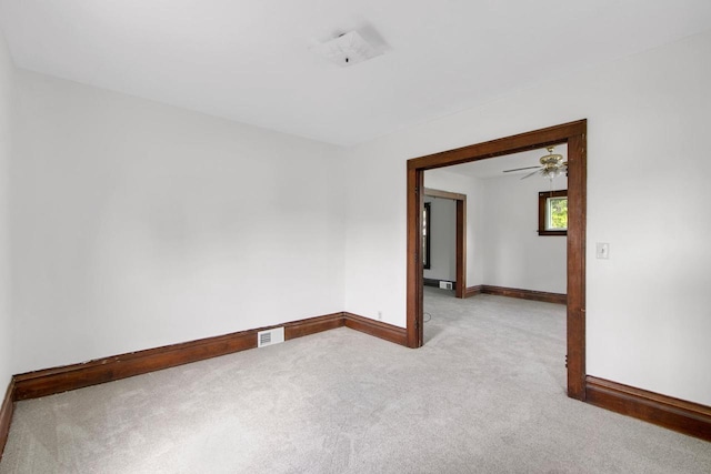 215 W Burns St, Portage, WI 53901 - carpeted empty room with baseboards